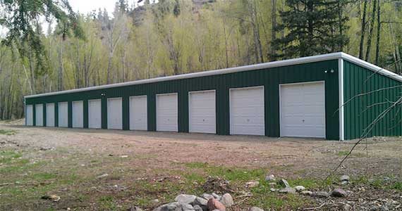 Multi-building mini storage layout with partition walls and roll-up doors.